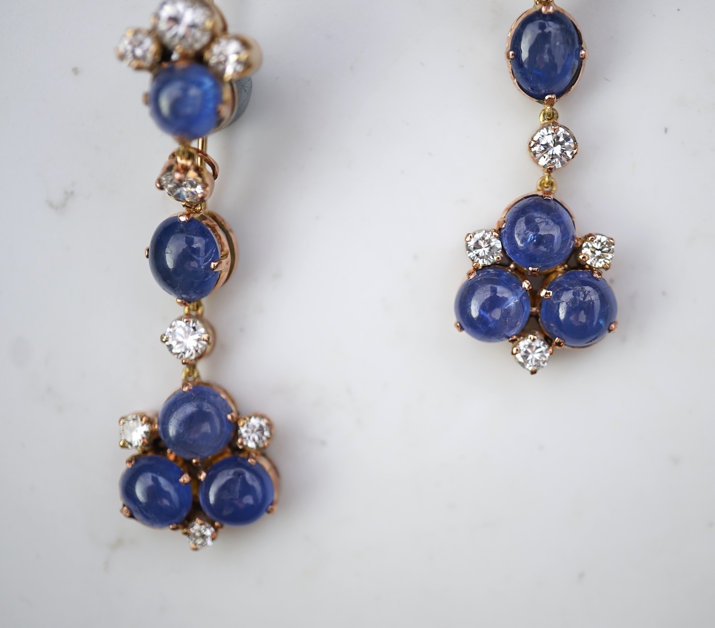 A pair of sapphire and diamond drop earrings